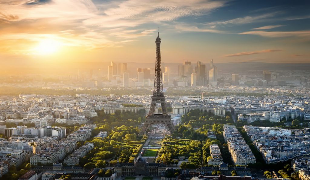 aerial view on eiffel tower over the city sunset