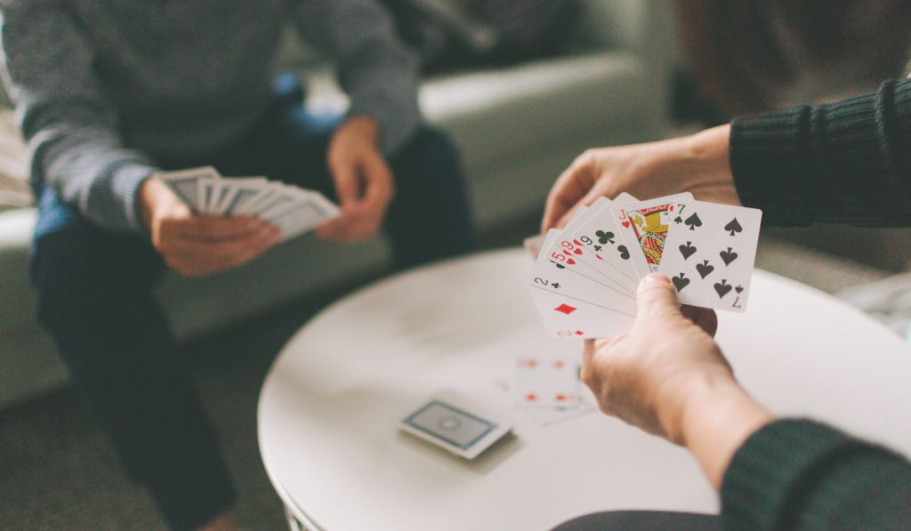 friends playing cards 